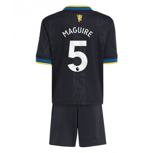 Stroje piłkarskie Manchester United Harry Maguire #5 Koszulka Trzeciej dla dzieci 2025-26 Krótki Rękaw (+ szorty)